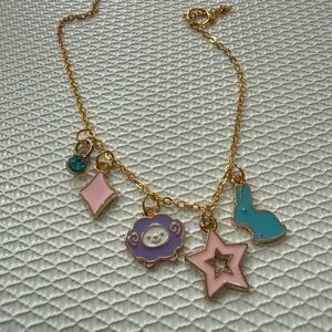 Gold Charm Bracelet with Pink and Blue Accents